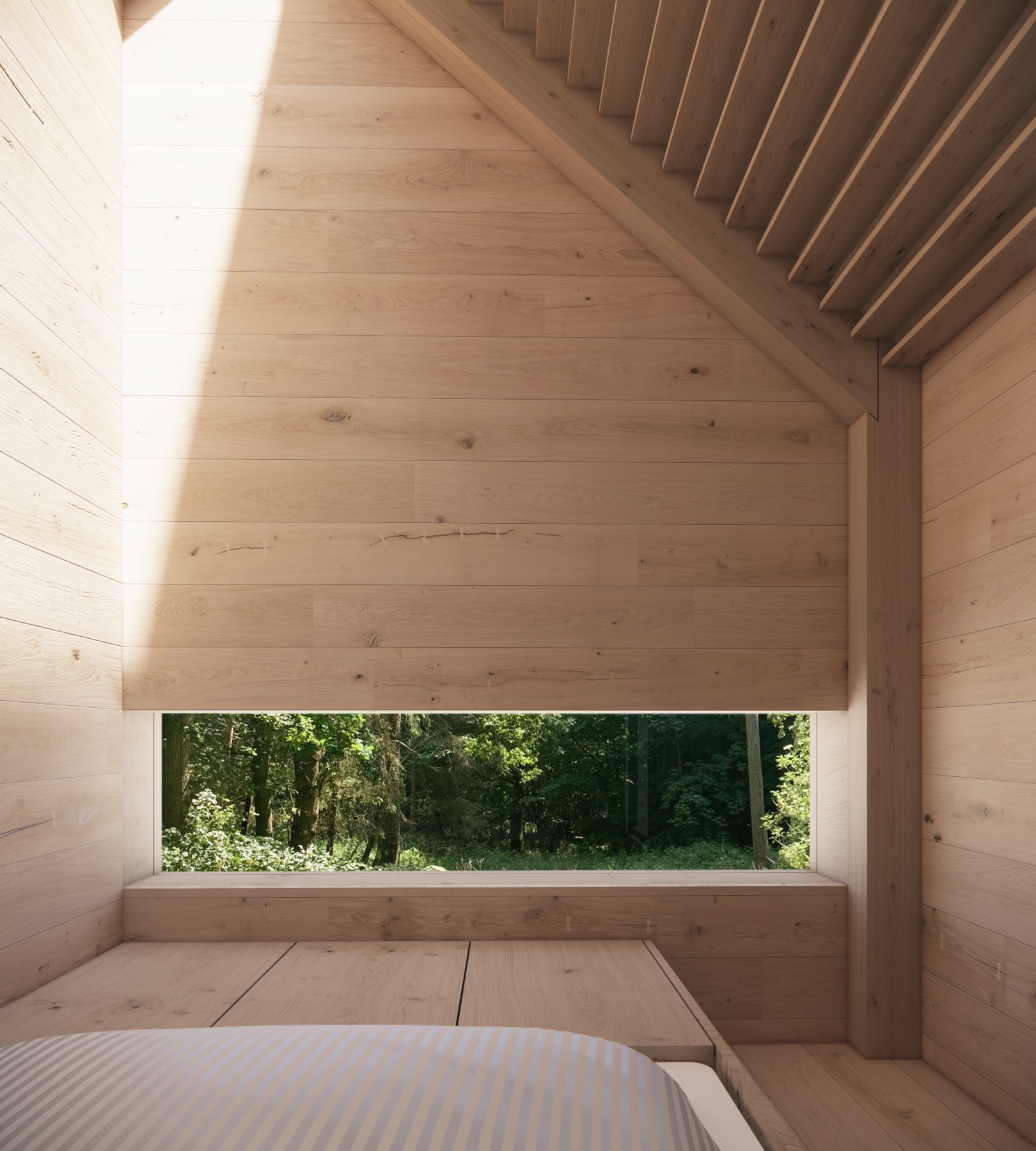 Lyst soveværelse med panoramavindue mod skoven